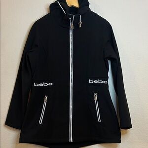 🧥Bebe women’s Black Raincoat with Hood waist  “19” inches long “28”